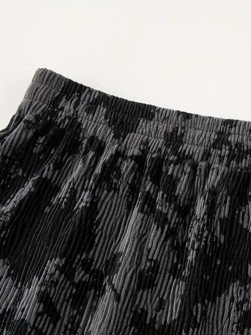 Grauer Plisseerock mit abstraktem Print